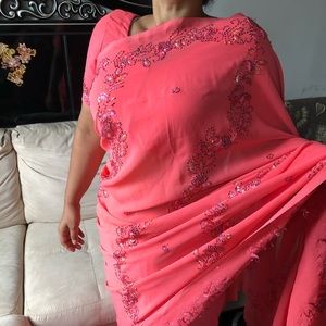 Georgette saree with embroidery and sequins work.